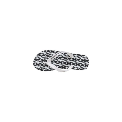 Flip-Flop Sandals by Armani Exchange for women in rubber black & white features an statuesque silhouette from the Women's Lightweight Rubber Flip-Flop Sandals collection, showcasing a statuesque and elegant .
