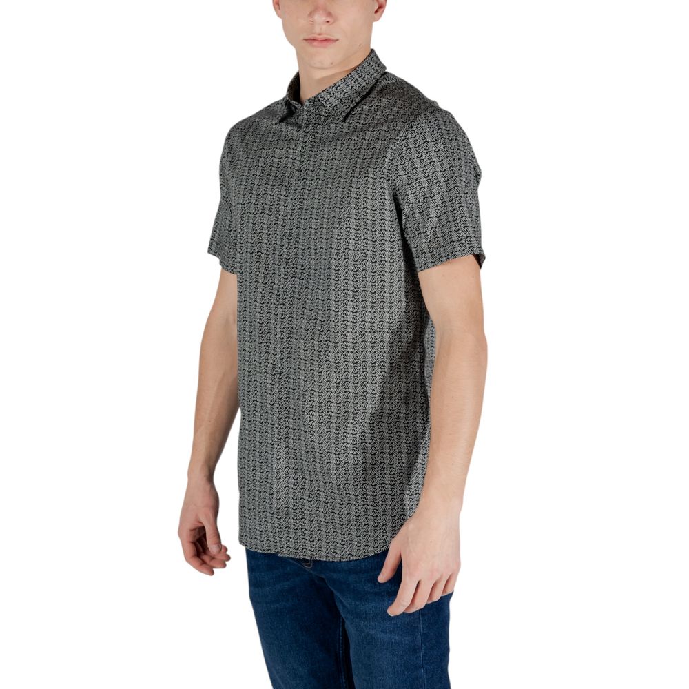 Shirt by Armani Exchange for men in stretch cotton black showcases a sublime silhouette, artfully detailed with a sublime and for a sophisticated, sublime finish.