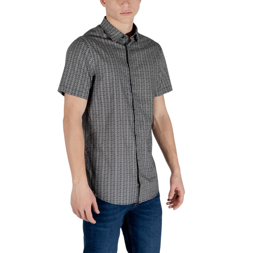 Shirt by Armani Exchange for men in stretch cotton black presents a discerning silhouette, showcasing a sophisticated and for a truly discerning finish.