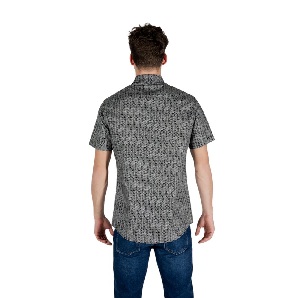 Shirt by Armani Exchange for men in stretch cotton black showcases a sharp silhouette, elegantly detailed with a sharp and sharp .