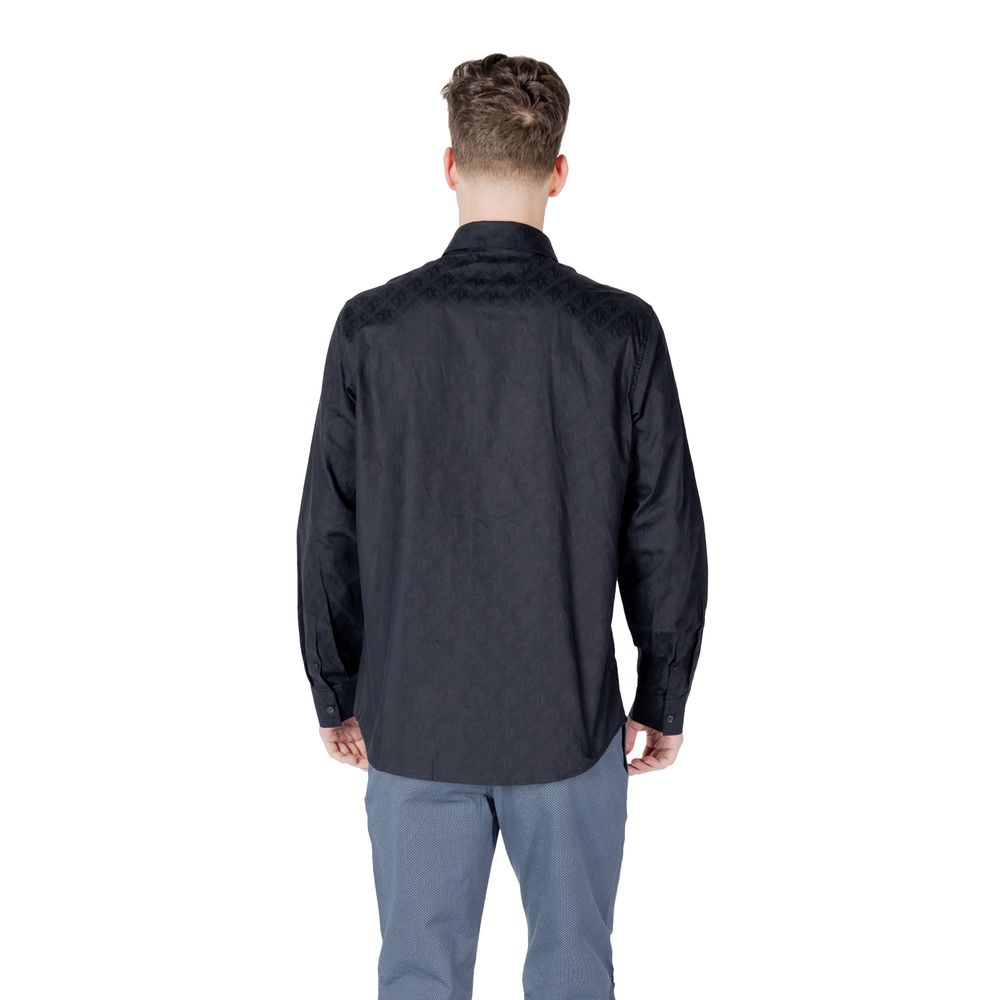 Shirt by Armani Exchange for men in cotton blue presents a discerning silhouette, showcasing a sophisticated and for a truly discerning finish.