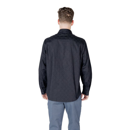 Shirt by Armani Exchange for men in cotton blue presents a discerning silhouette, showcasing a sophisticated and for a truly discerning finish.