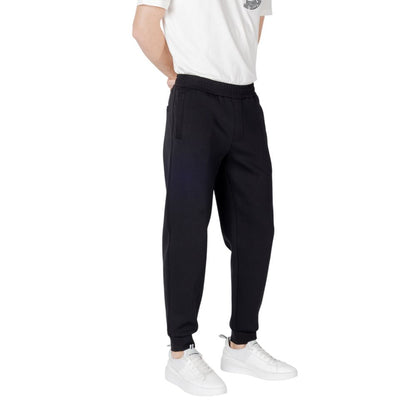 Activewear Jogger Pants by Armani Exchange for men in stretch polyester cotton black features a contemporary silhouette with , a contemporary , long hem, and for a premium, high-performance aesthetic.