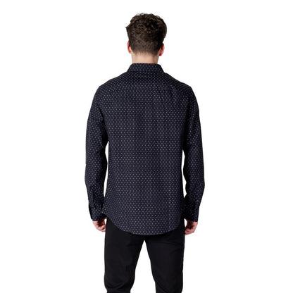 Shirt by Armani Exchange for men in cotton blue presents a discerning silhouette, showcasing a sophisticated and for a truly discerning finish.