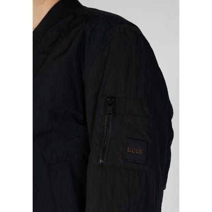 Bomber Jacket by Hugo Boss for men in polyamide cotton black presents a effortlessly chic silhouette, showcasing a sophisticated and premium lightweight & pockets for a truly effortlessly chic finish.