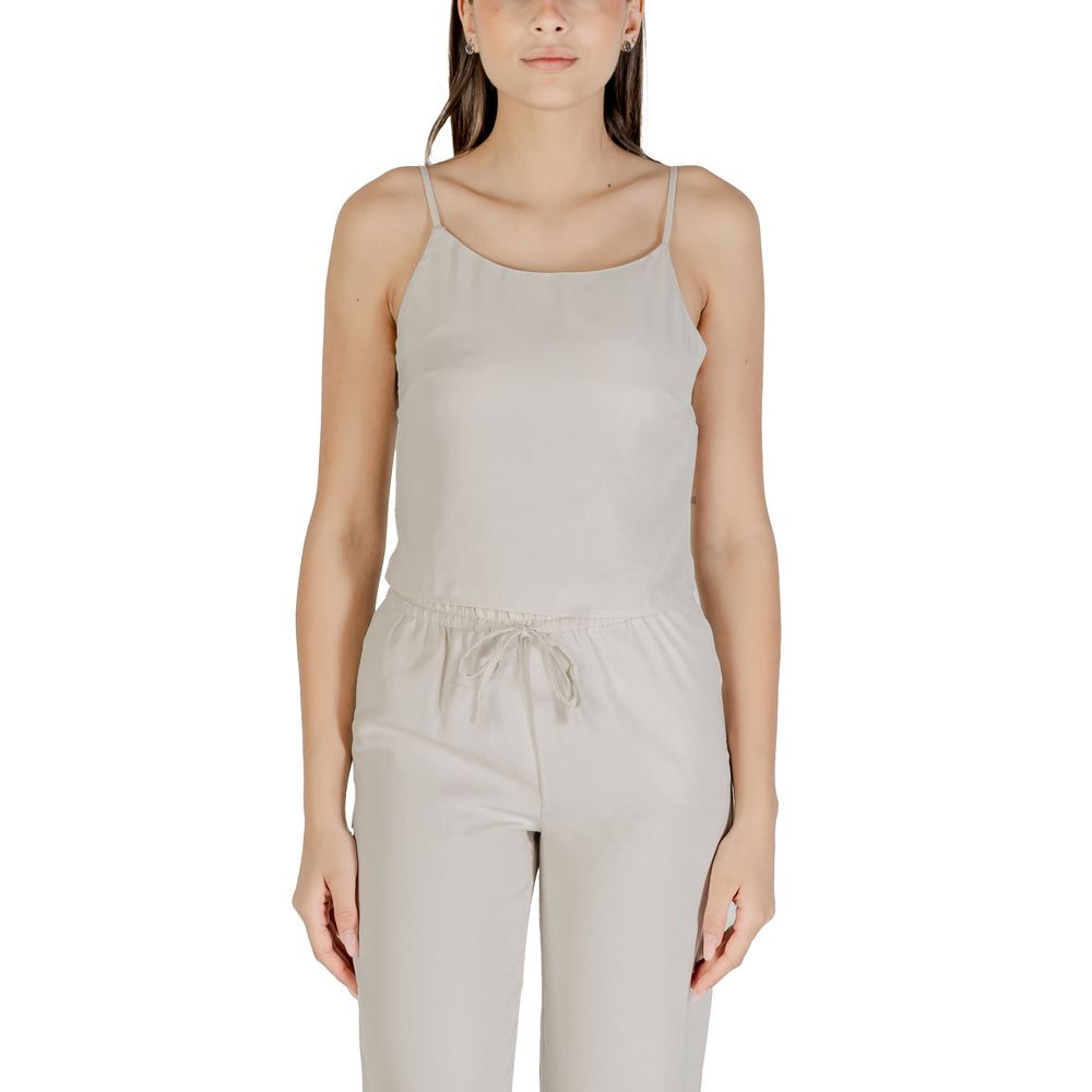 Activewear Top by Only for women in polyester beige showcases a sporty silhouette, detailed with a sporty and that seamlessly integrates functional .