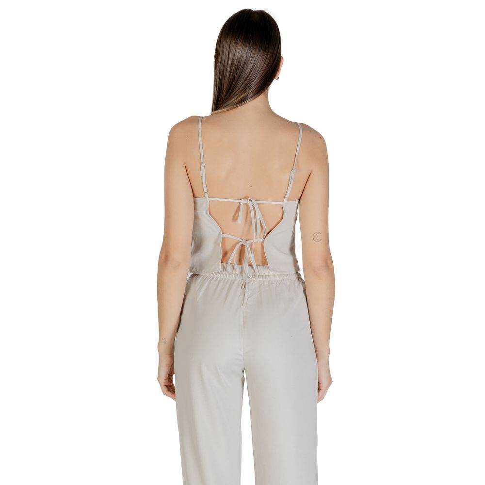 Activewear Top by Only for women in polyester beige showcases a versatile silhouette, finished with a versatile , , and high-performance for a versatile look.