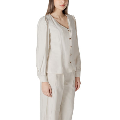Activewear Top by Vila Clothes for women in polyester & viscose cream showcases an streamlined silhouette, featuring a refined v-neck neckline and detailed with functional for a streamlined finish.