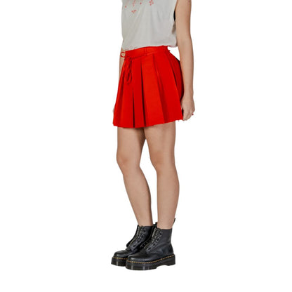 Skirt by Only for women in polyester red showcases a dramatic silhouette, artfully capturing the essence of the Women's Mini Polyester Skirt in a dramatic mini cut for a refined look.