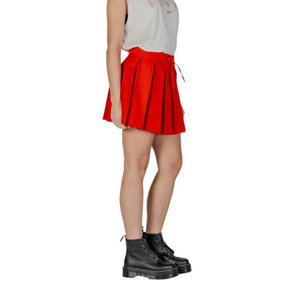 Skirt by Only for women in polyester red showcases a sultry silhouette, elegantly defined by its mini and the sophisticated sultry design of the Women's Mini Polyester Skirt.