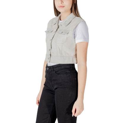 Vest by Only for women in cotton light-blue showcases a dynamic silhouette, perfectly balancing pockets with a dynamic for a sophisticated, high-fashion look.