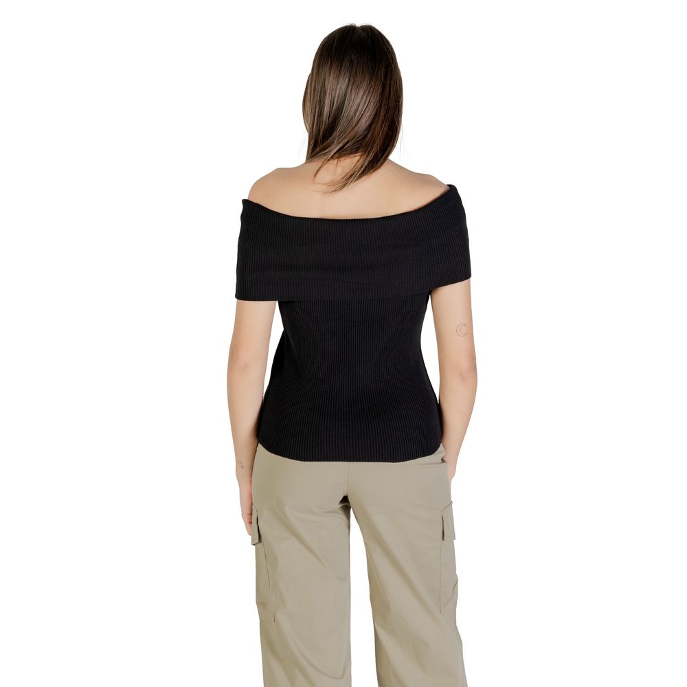 Shirt by Only for women in cotton polyester black showcases a sleek silhouette, elegantly detailed with a sleek and for a sleek finish.