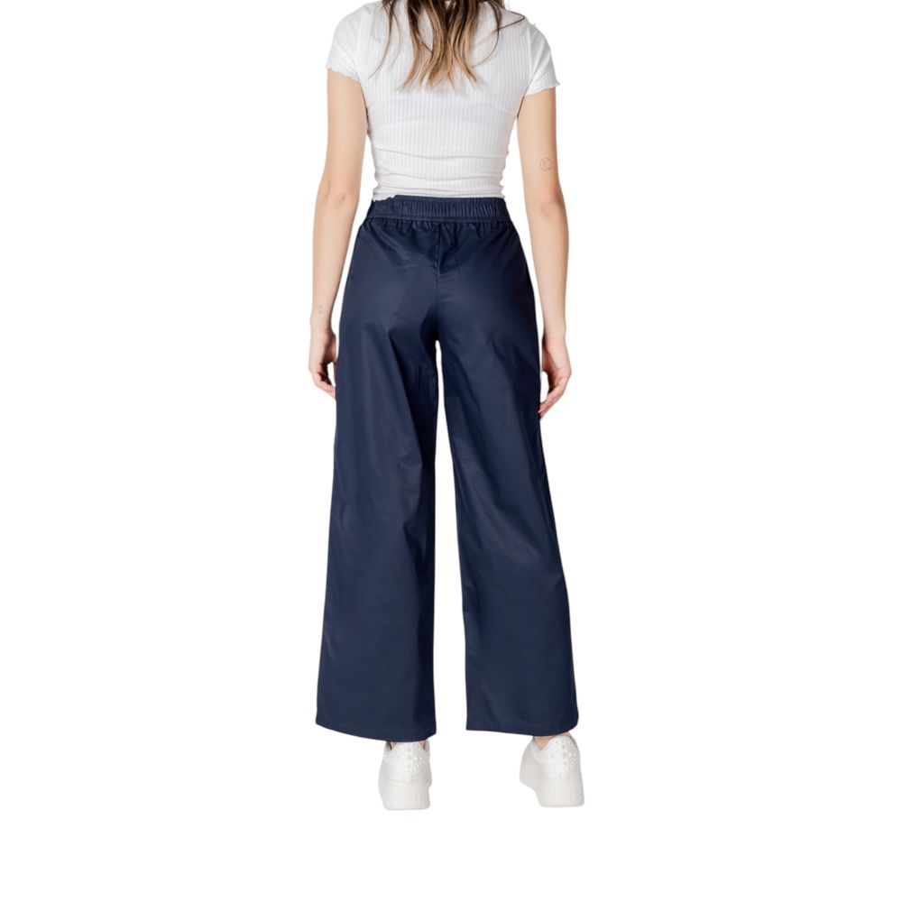 Trousers by Only for women in cotton blue features a tailored silhouette with a tailored wide, defined by its long and a sophisticated .