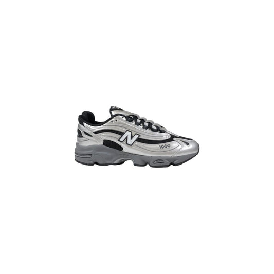 Sneakers by New Balance for men in synthetic textile & mesh silver presents a sumptuous silhouette, artfully capturing the essence of the Men's Athletic Synthetic Textile & Mesh Sneakers with its sumptuous athletic style design.
