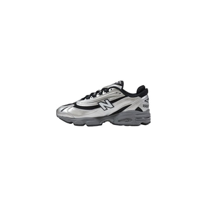 Sneakers by New Balance for men in synthetic textile & mesh silver features an opulent silhouette from the Men's Athletic Synthetic Textile & Mesh Sneakers collection, showcasing a signature athletic style with an opulent finish.