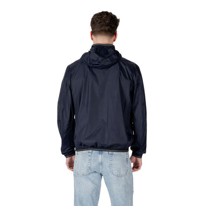 Windbreaker Jacket by Blauer for men in polyamide blue showcases a urban chic silhouette, detailed with a urban chic and functional pockets & windproof for a polished finish.