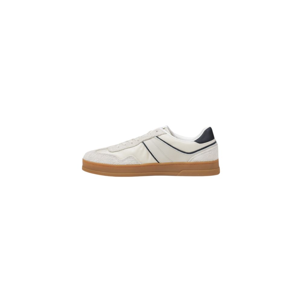 Sneakers by Tommy Hilfiger Jeans for men in leather & rubber cream presents a sumptuous silhouette as Men's Low-Top Casual Leather & Rubber Sneakers, expertly defined by a sumptuous low-top casual style for a sumptuous, high-fashion look.