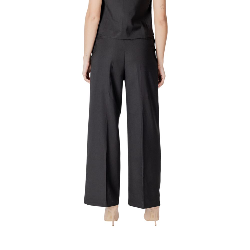 Trousers by ICHI for women in stretch polyester black presents a smart silhouette, meticulously detailed with a smart straight-leg & wide, a smart long, and a smart .