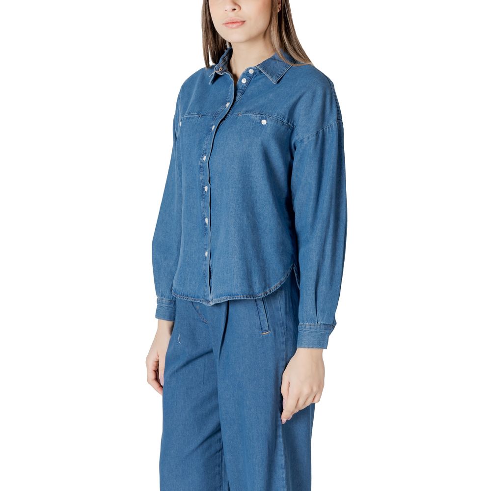 Shirt by ICHI for women in denim cotton blue showcases a sleek silhouette, elegantly detailed with a sleek and for a sleek finish.