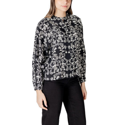 Shirt by ICHI for women in polyamide viscose black & floral showcases a sleek silhouette, elegantly detailed with a sleek mandarin neckline and for a sleek finish.