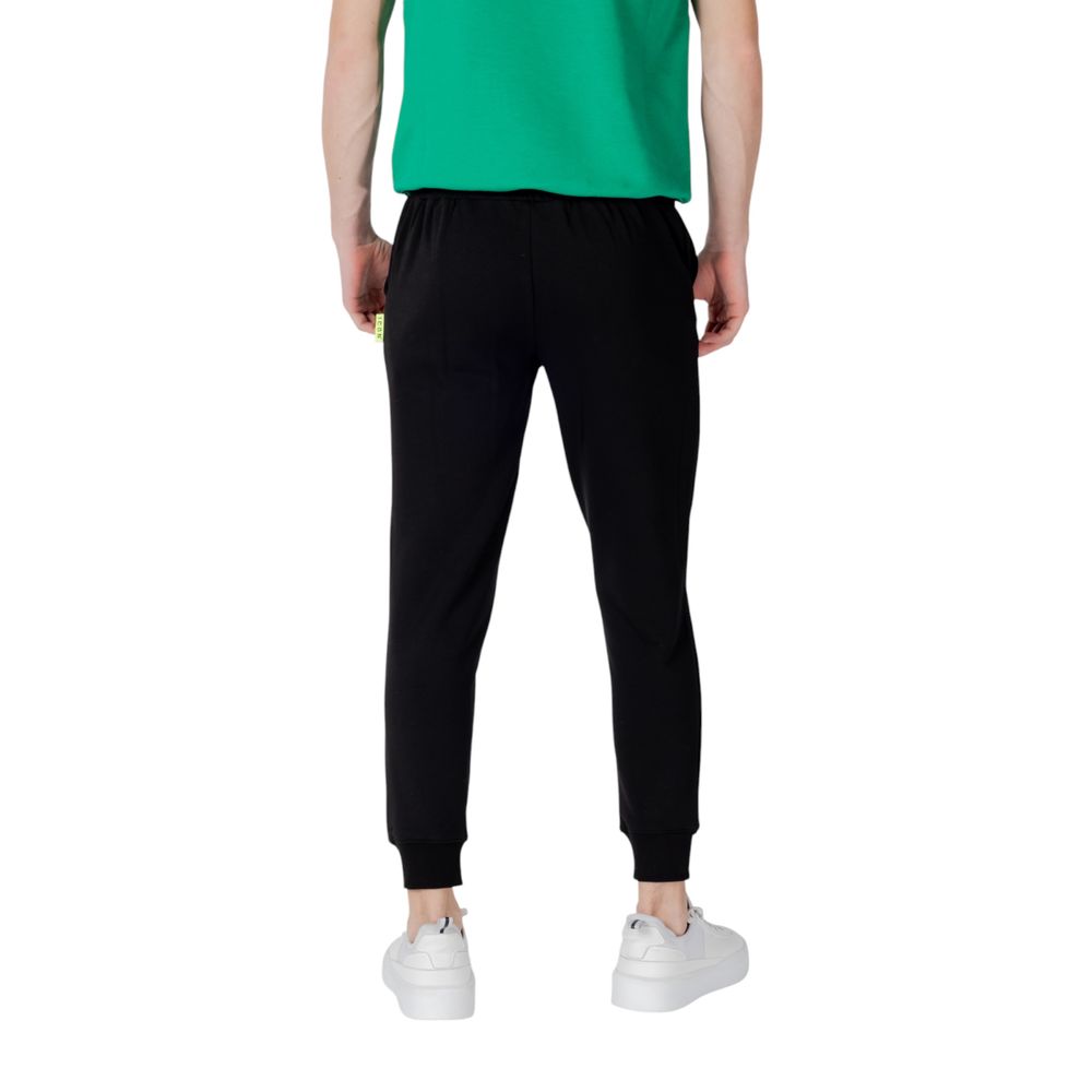 Activewear Jogger Pants by Icon for men in cotton polyester black features an sporty slim with a and long, showcasing sporty .