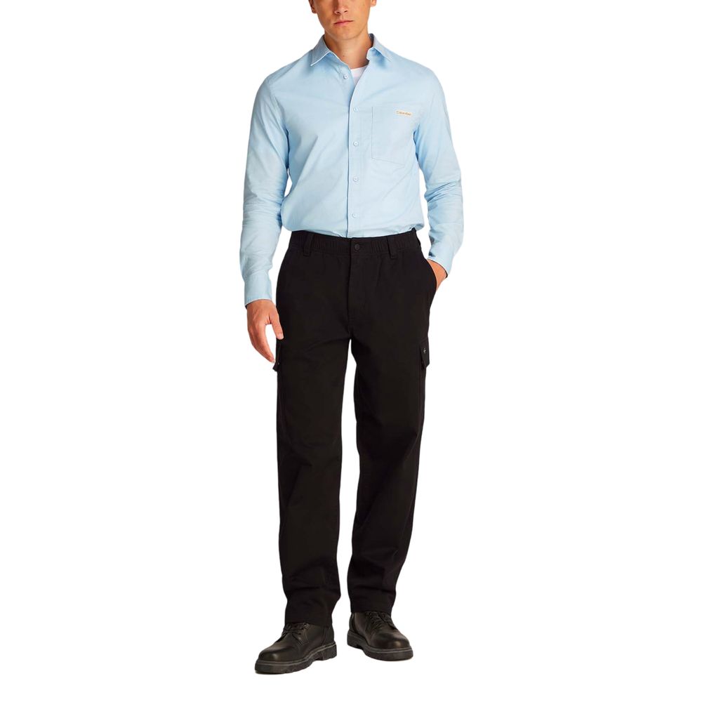 Cargo Pants by Calvin Klein Jeans for men in stretch cotton black features an urban chic straight-leg & regular-fit with a and long, creating a urban chic aesthetic for "Moon Behind the Hill".