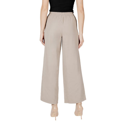 Trousers by Only for women in polyester & viscose beige presents a perennial silhouette, meticulously tailored with a wide cut, long finish, and an elegant high rise.