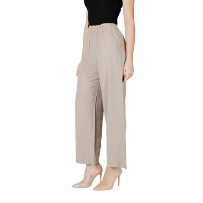 Trousers by Only for women in polyester & viscose beige features a sculptural silhouette, showcasing a sculptural wide and long with a sophisticated high rise for a sculptural finish.