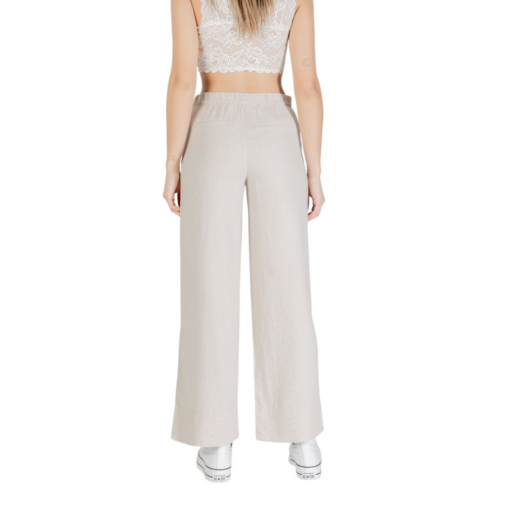 Trousers by Only for women in linen & viscose beige features a tailored silhouette with a tailored wide, defined by its long and a sophisticated .
