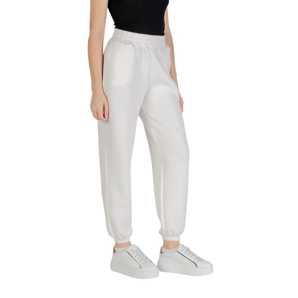 Activewear Jogger Pants by Guess Active for women in stretch polymide viscose cream features a contemporary silhouette with , a contemporary , long hem, and for a premium, high-performance aesthetic.
