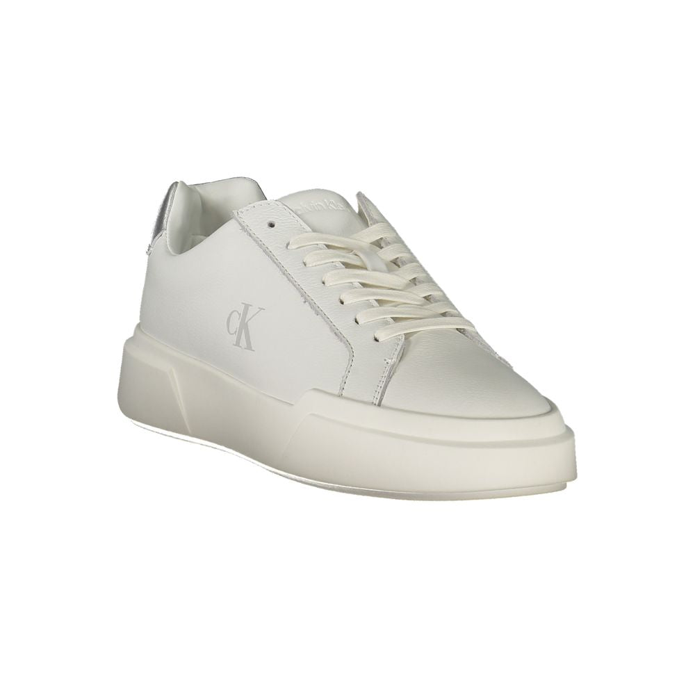 Athletic Sneakers by Calvin Klein for women in polyester polyethylene leather silver & white features an stately silhouette, showcasing the signature athletic style of the Women's Athletic Polyester Polyethylene Leather Sneakers collection with a truly stately finish.