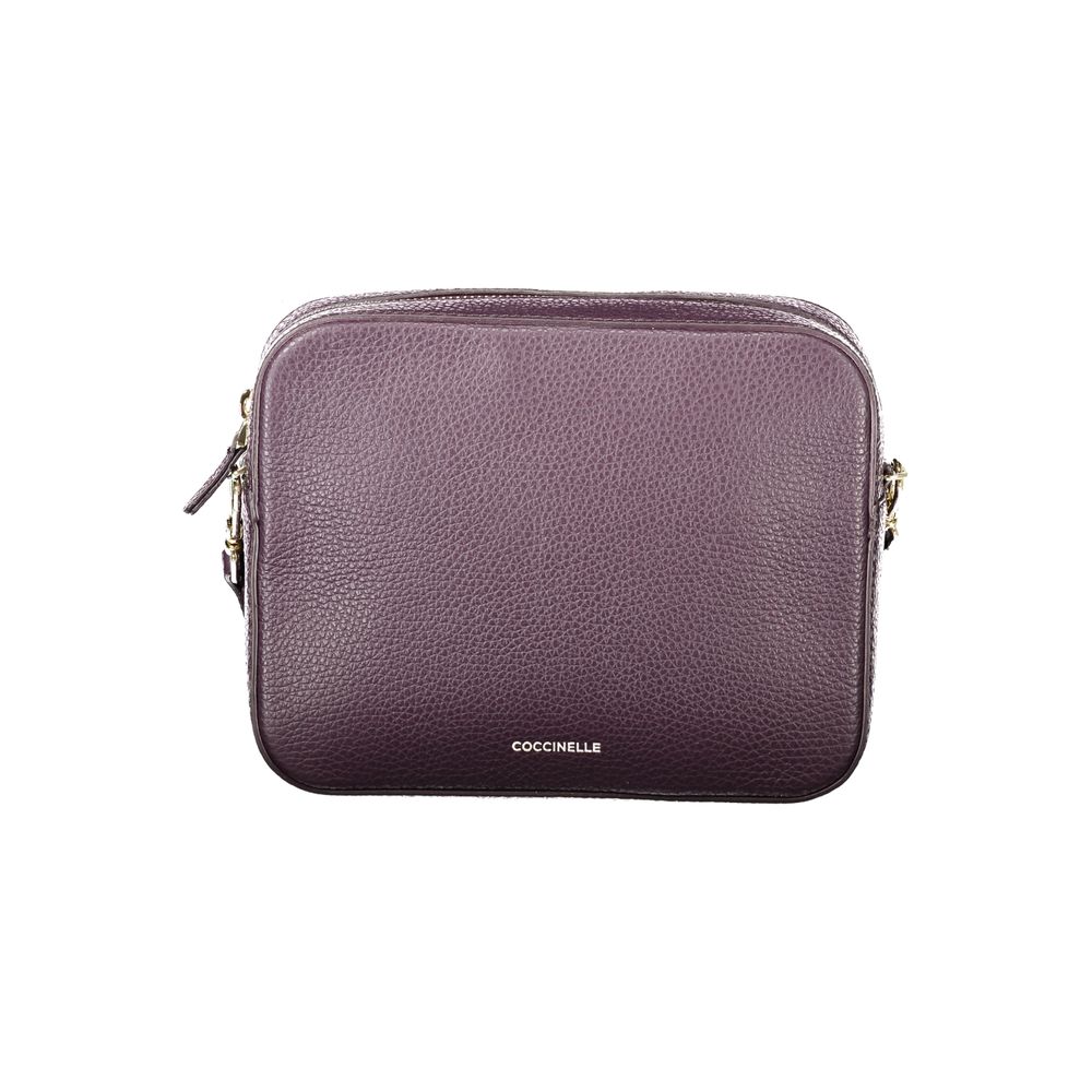 Mini Handbag by Coccinelle for women in leather purple features a ornamental silhouette, showcasing a secure zipper, ample , and ornamental shoulder-strap & adjustable-strap for a sophisticated look.