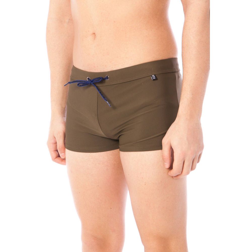 Swim Briefs by Datch for men in elastane green features a riviera-ready silhouette, showcasing the riviera-ready design of the Men's Elastane Swim Briefs for a sophisticated look.