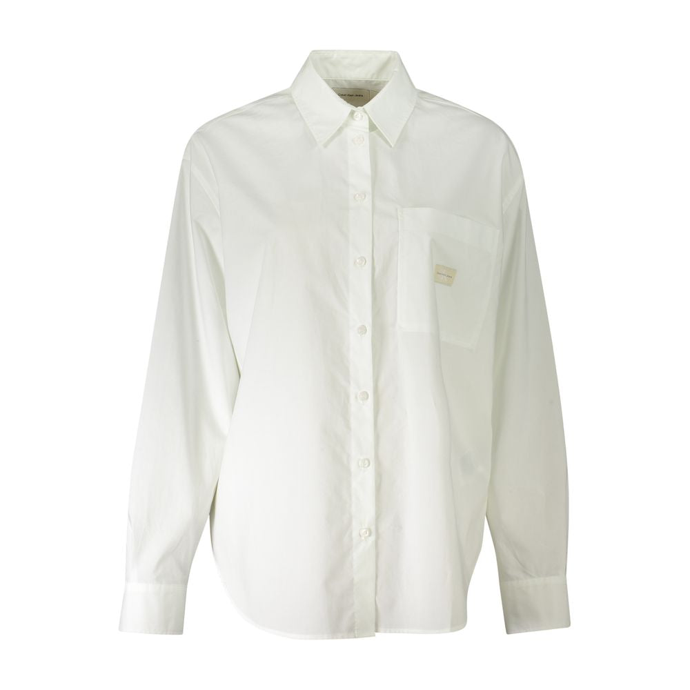 Dress Shirt by Calvin Klein for women in cotton white features an polished silhouette, showcasing a sophisticated and long-sleeve detail for a truly polished finish.