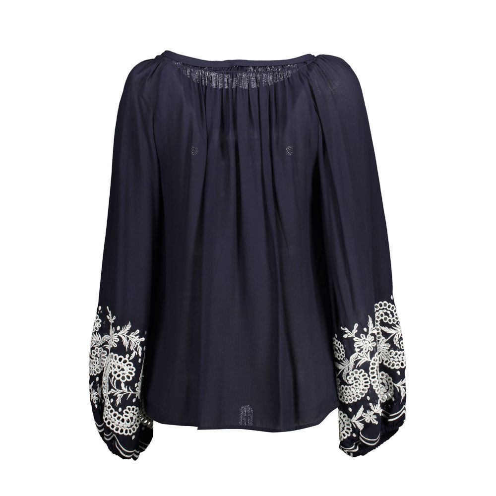 Shirt by Kocca for women in viscose blue presents a discerning silhouette, showcasing a sophisticated and for a truly discerning finish.