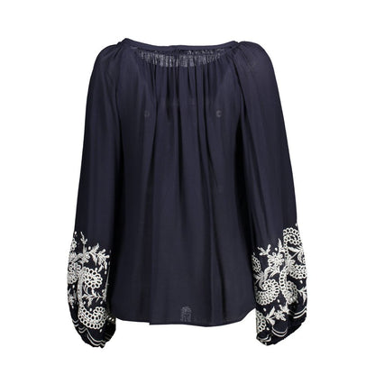 Shirt by Kocca for women in viscose blue presents a discerning silhouette, showcasing a sophisticated and for a truly discerning finish.