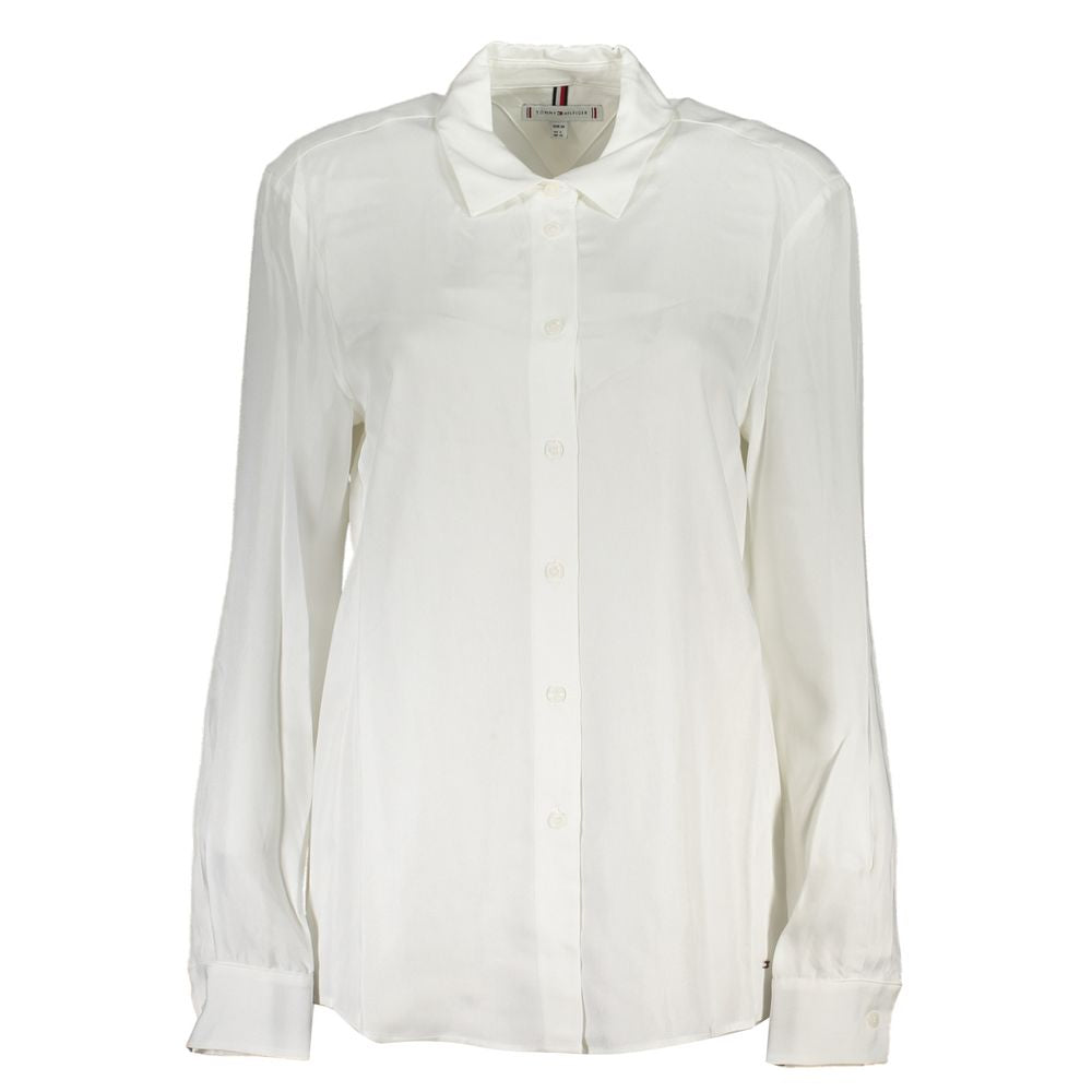 Dress Shirt by Tommy Hilfiger for women in viscose white showcases a sublime silhouette, artfully detailed with a sublime and long-sleeve for a sophisticated, sublime finish.