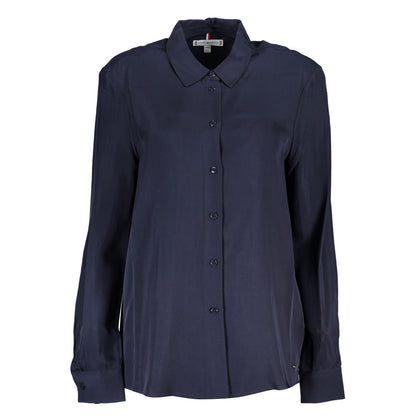 Dress Shirt by Tommy Hilfiger for women in viscose blue features an architectural silhouette with a refined long-sleeve and elegant for a architectural look.