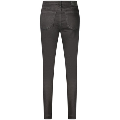 Jeans by Calvin Klein for women in denim cotton black presents a refined pantology silhouette, artfully defined by a refined pantology slim, long, and a sophisticated mid rise.