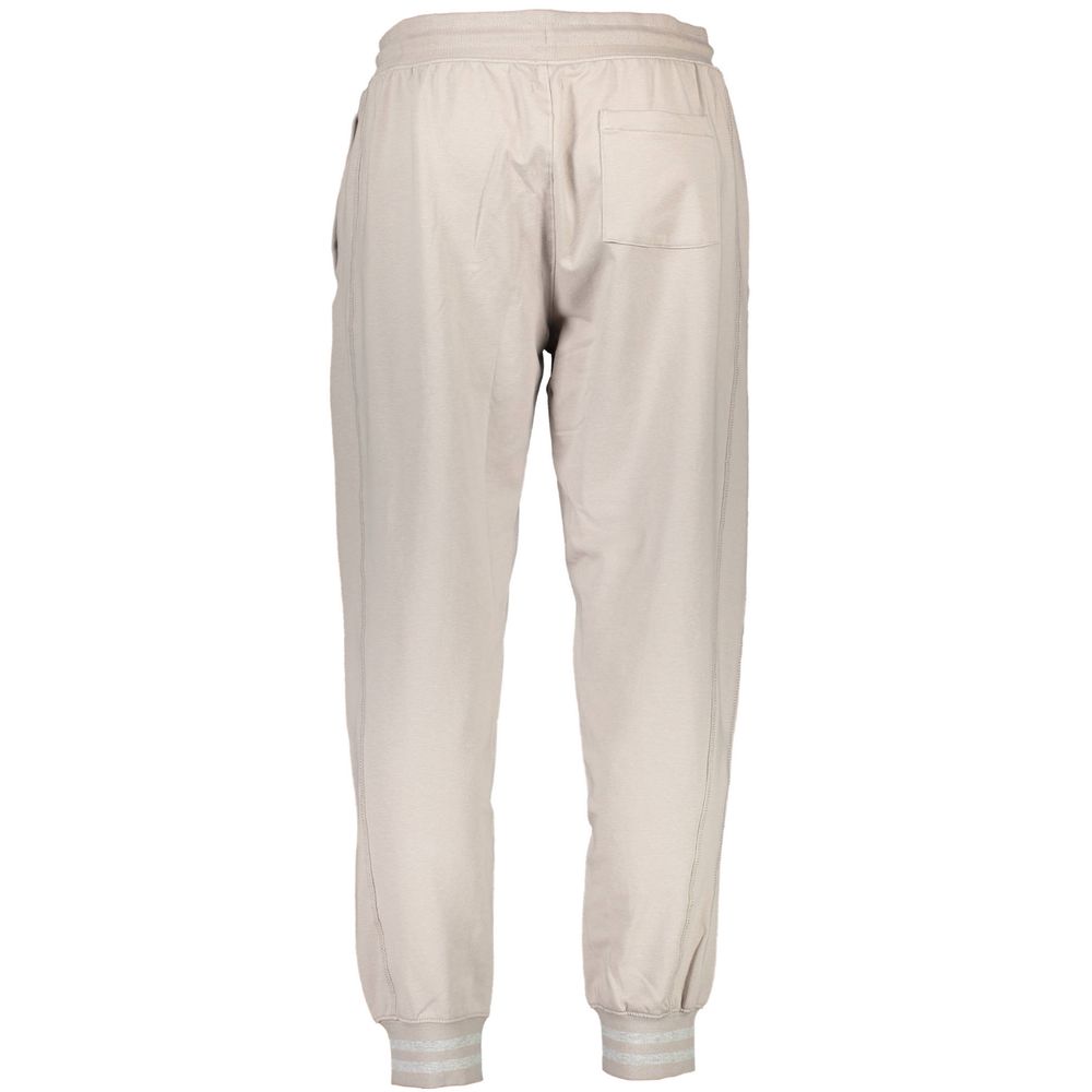 Pants by Guess Jeans for men in organic cotton beige features a enduring silhouette, showcasing a enduring and long with a for a premium, tailored aesthetic.
