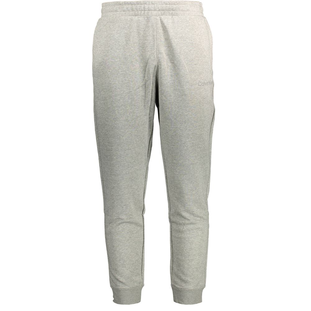 This Calvin Klein men cotton Activewear in gray presents a contemporary silhouette from the Men's Cotton Activewear collection, emphasizing high-performance adjustable-waistband for an elevated contemporary fit.