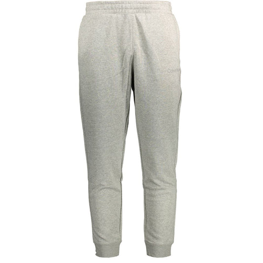This Calvin Klein men cotton Activewear in gray presents a contemporary silhouette from the Men's Cotton Activewear collection, emphasizing high-performance adjustable-waistband for an elevated contemporary fit.