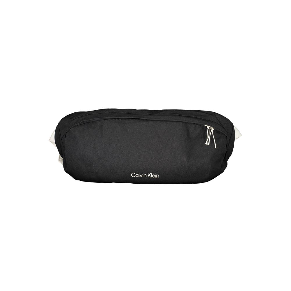 Belt Pouch Handbag by Calvin Klein for unisex in polyester black features a refined silhouette, showcasing a secure snap, zipper & buckle, organized laptop-compartment, and versatile belt-strap for a refined finish.