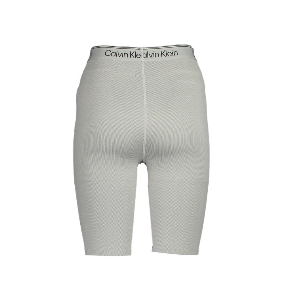 Short Trousers by Calvin Klein for women in polyester gray showcases an effortlessly refined silhouette, meticulously detailed with a effortlessly refined , a effortlessly refined , and a short for a refined finish.