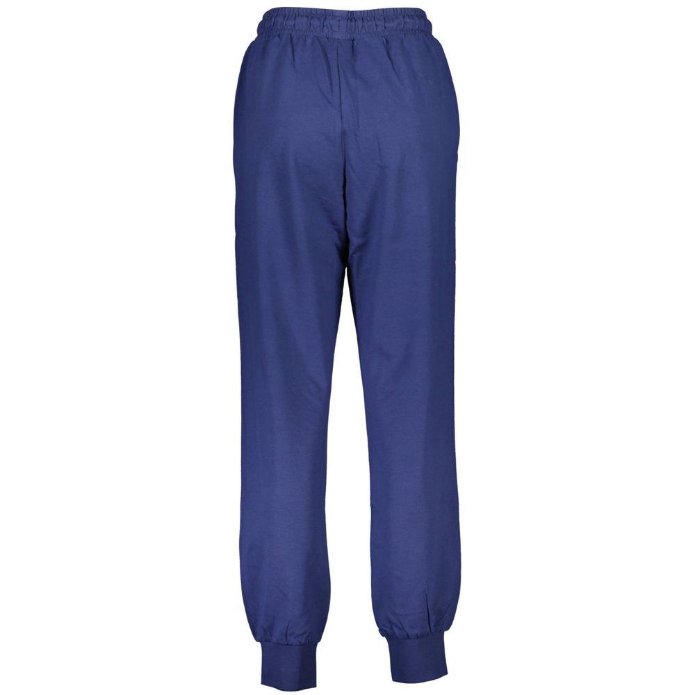 Pants by Fila for women in cotton blue showcases a unrivaled comfort silhouette, featuring a cut and long with a for a unrivaled comfort and refined aesthetic.