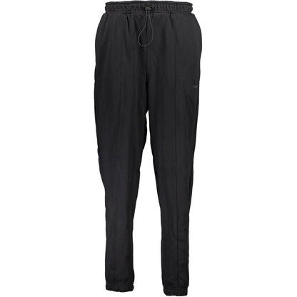 Activewear Pants by Calvin Klein for women in cotton black features an sporty with a long and , expertly finished with adjustable-waistband for an sporty performance aesthetic.