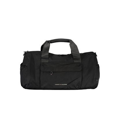Handbag by Tommy Hilfiger for unisex in polyester black & print features a ornamental silhouette, showcasing a secure zipper, ample built-in-compartments, external-pockets & internal-pockets, and ornamental shoulder-strap, adjustable-strap & handle for a sophisticated look.