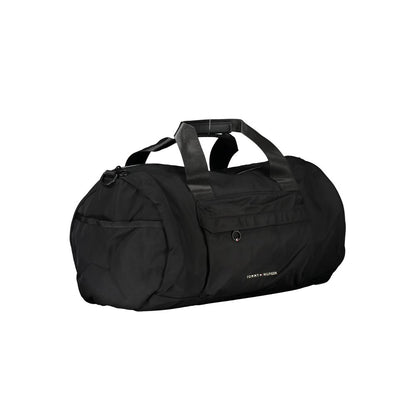 Handbag by Tommy Hilfiger for unisex in polyester black & print features a ornamental silhouette, showcasing a secure zipper, ample built-in-compartments, external-pockets & internal-pockets, and ornamental shoulder-strap, adjustable-strap & handle for a sophisticated look.