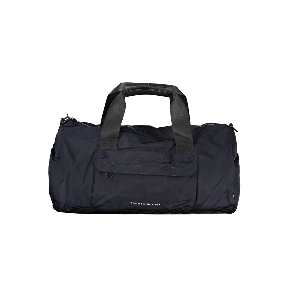 Handbag by Tommy Hilfiger for unisex in polyester blue, signature & print presents a ornamental silhouette, showcasing a secure zipper, ample external-pockets & internal-pockets, and versatile shoulder-strap, adjustable-strap & handle for a ornamental finish.
