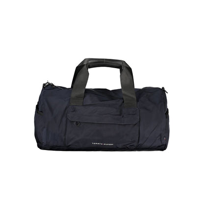 Handbag by Tommy Hilfiger for unisex in polyester blue, signature & print presents a ornamental silhouette, showcasing a secure zipper, ample external-pockets & internal-pockets, and versatile shoulder-strap, adjustable-strap & handle for a ornamental finish.